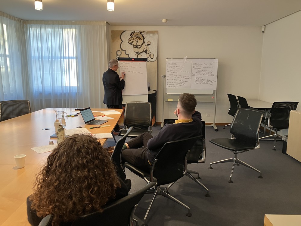 Nick de Leon leads a workshop on design thinking for Nico Pfaeffli and Mathilde Reyes