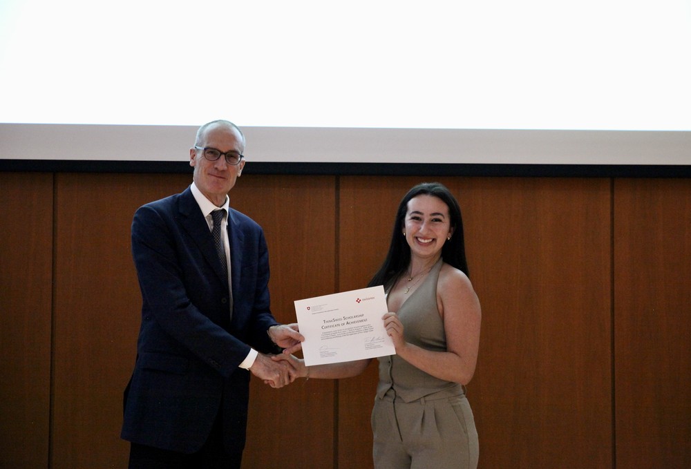 Swiss Academia Night: A 2025 ThinkSwiss awardee receiving their Certificates of Completion from Ambassador Dr. Ralf Heckner