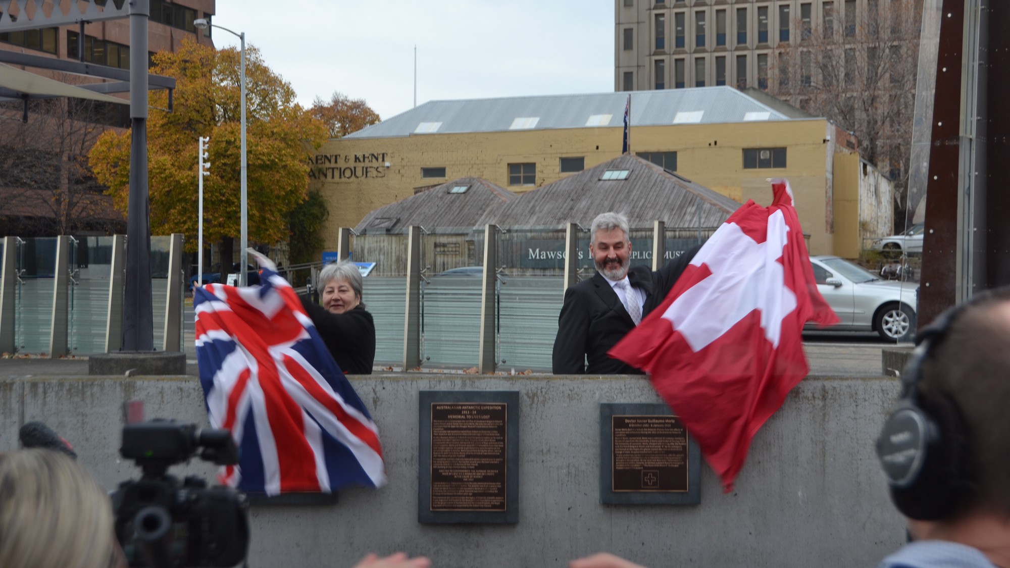 Ambassador Pedro Zwahlen and British High Commissioner Vicki Treadell unveiling a memorial to Antarctic research pioneers Dr Xavier Mertz and Belgrave Ninnis