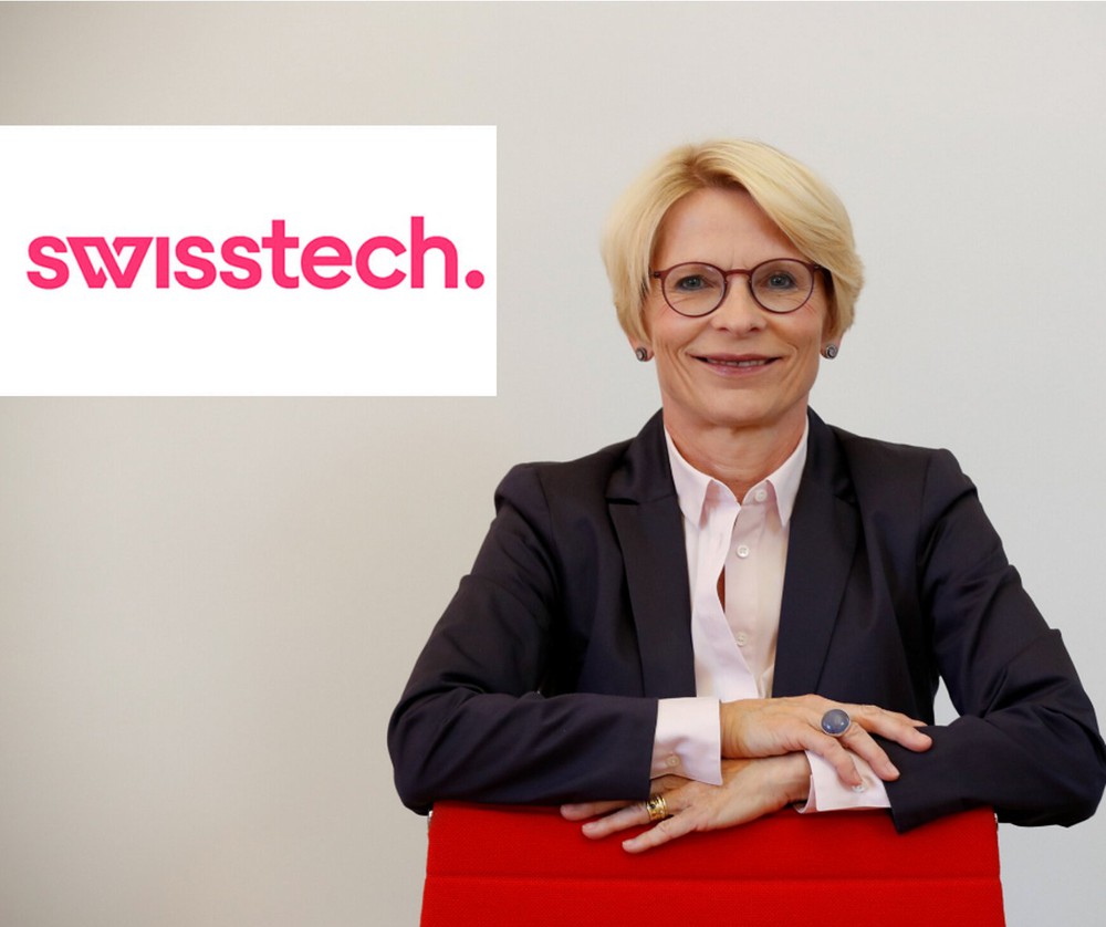 Ambassador Livia Leu with the Swisstech logo in the background