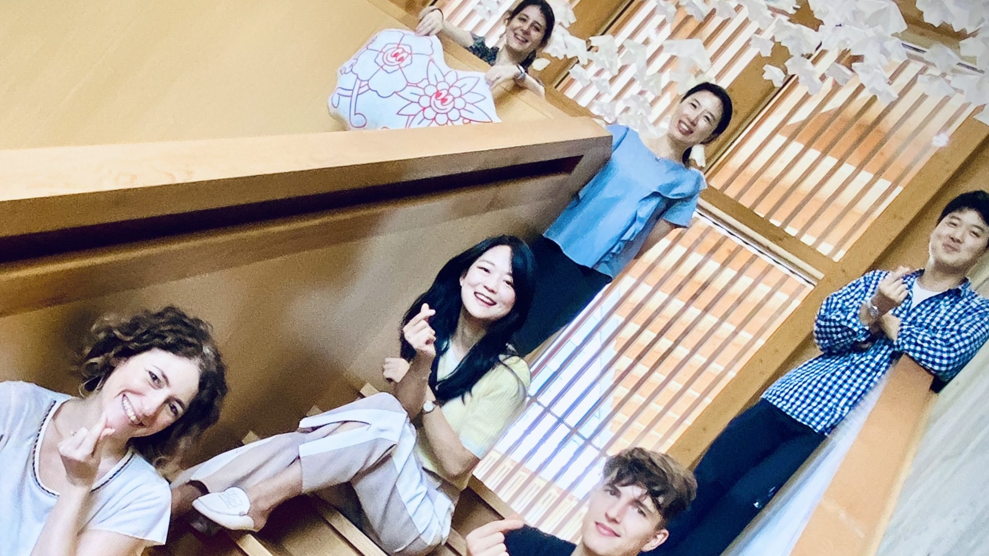 Bottom (stairs): Alessandra Apicella, Head; Gregory Vionnet, Academic Intern; Ji Yeon Lee, Academic Lead. Standing, left to right: Laura Acosta, Project Manager entrepreneurship & startups; Ji Hyun Li