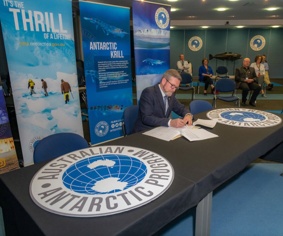 Mr Kim Ellis, Director of the Australian Antarctic Division, signs the Statement of Commitment (Photo credit: Dan Broun)