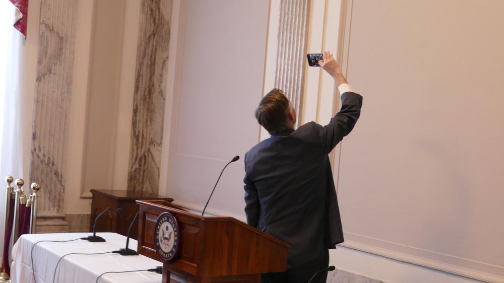 Senator Hickenlooper taking a Selfie